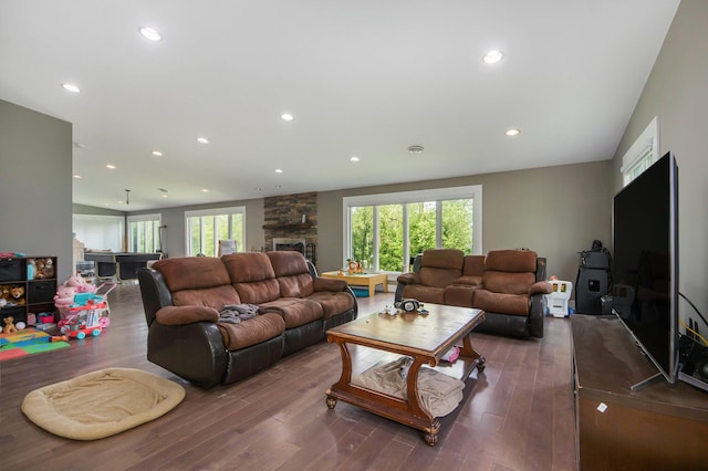 1710 Kreft St NE, Grand Rapids, MI 49525 - living room featuring wood finished floors, recessed lighting, and a fireplace