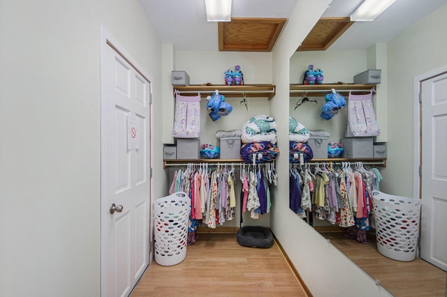 1710 Kreft St NE, Grand Rapids, MI 49525 - walk in closet with wood finished floors