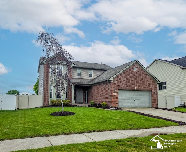 1997 Teton Ave, Monroe, MI 48162 - traditional-style home featuring a gate, brick siding, a garage, concrete driveway, and roof with shingles