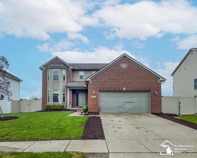 1997 Teton Ave, Monroe, MI 48162 - view of front of property featuring a gate, brick siding, concrete driveway, and a garage