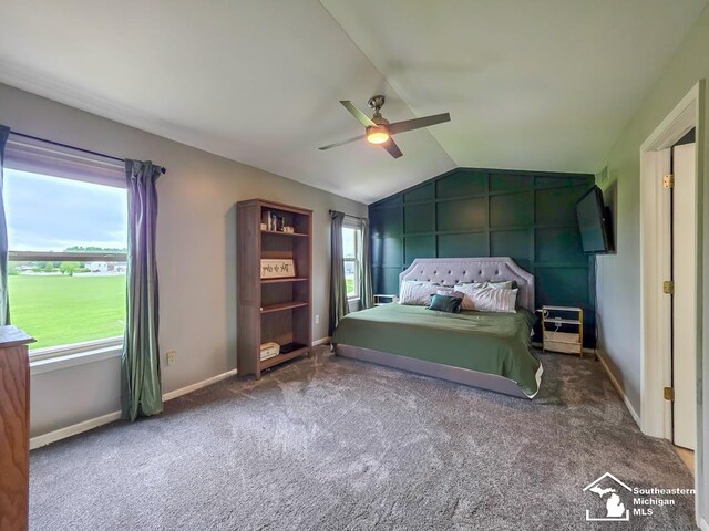 1997 Teton Ave, Monroe, MI 48162 - bedroom with vaulted ceiling, multiple windows, baseboards, carpet floors, and ceiling fan