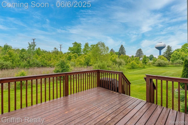 2870 Grand Marais Dr, Howell, MI 48843 - wooden deck with a yard