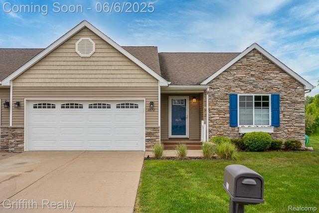 2870 Grand Marais Dr, Howell, MI 48843 - view of front of house with stone siding, an attached garage, concrete driveway, and a front lawn