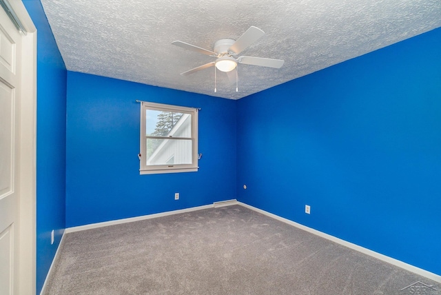 5211 S Gatesboro Dr, Saginaw, MI 48603 - carpeted spare room with ceiling fan, a textured ceiling, and baseboards
