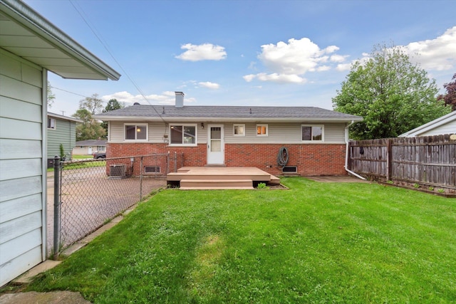 5371 Durwood Dr, Swartz Creek, MI 48473 - back of house with brick siding, a deck, a gate, and central air condition unit