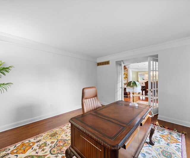 1150 Heatherlea Ct, Canton, MI 48188 - office with wood finished floors, crown molding, and baseboards