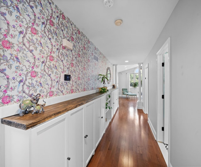 1150 Heatherlea Ct, Canton, MI 48188 - hallway with wallpapered walls, hardwood / wood-style flooring, and baseboards