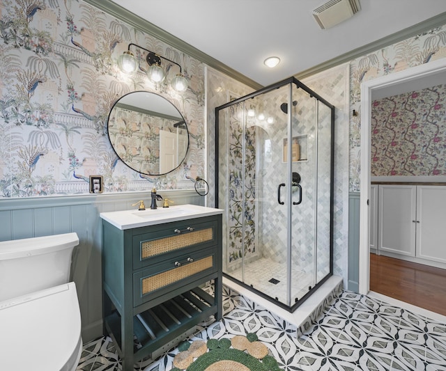 1150 Heatherlea Ct, Canton, MI 48188 - bathroom featuring wallpapered walls, vanity, a wainscoted wall, toilet, and a stall shower