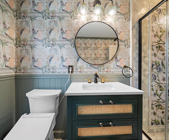 1150 Heatherlea Ct, Canton, MI 48188 - full bathroom featuring wallpapered walls, vanity, toilet, a wainscoted wall, and a shower