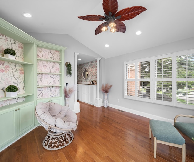 1150 Heatherlea Ct, Canton, MI 48188 - living area with vaulted ceiling, ceiling fan, plenty of natural light, wood finished floors, and baseboards