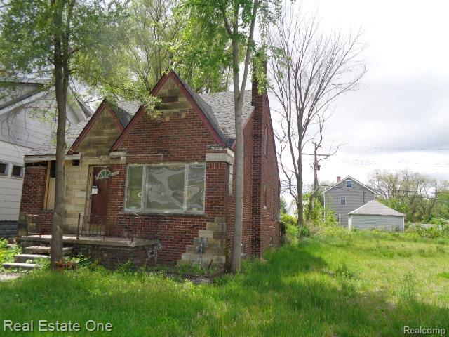 13493 Conley St, Hamtramck, MI 48212 - view of front of property featuring brick siding and a chimney