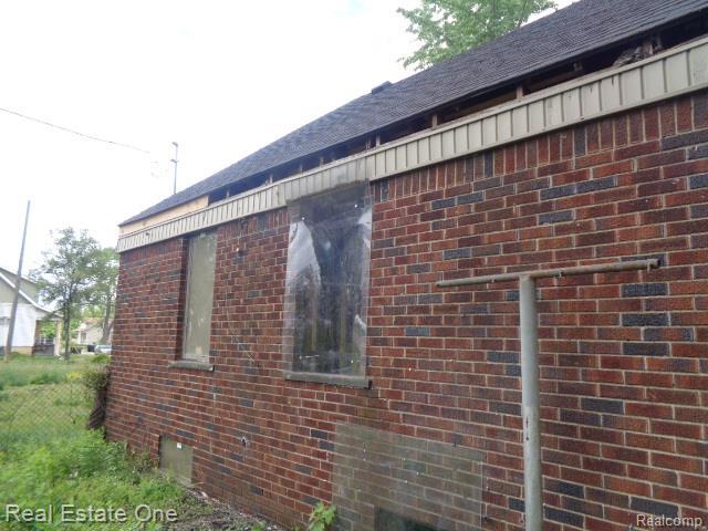 13493 Conley St, Hamtramck, MI 48212 - view of property exterior with brick siding