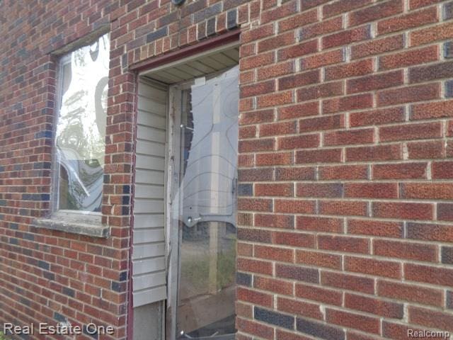 13493 Conley St, Hamtramck, MI 48212 - entrance to property featuring brick siding