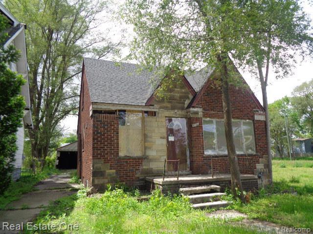 13493 Conley St, Hamtramck, MI 48212 - english style home featuring brick siding and a shingled roof