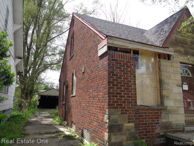 13493 Conley St, Hamtramck, MI 48212 - view of side of home with brick siding and roof with shingles