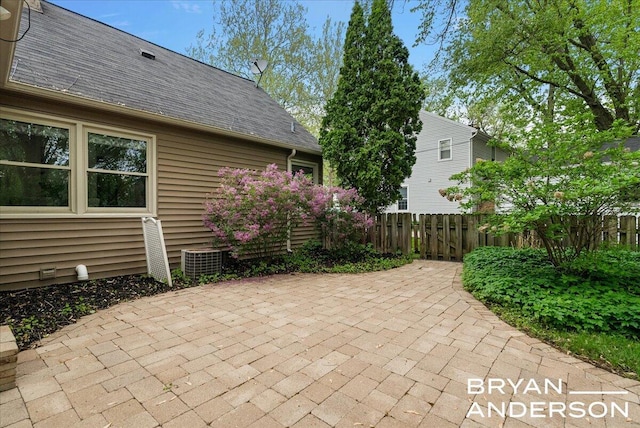 2120 Englewood Dr SE, East Grand Rapids, MI 49506 - view of patio / terrace featuring central AC unit