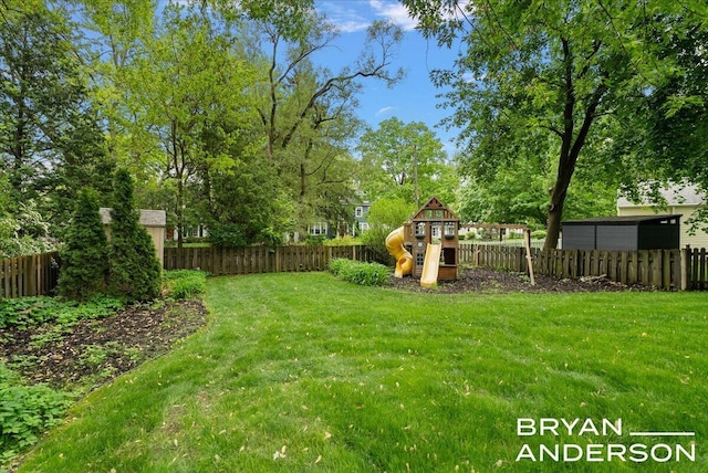 2120 Englewood Dr SE, East Grand Rapids, MI 49506 - view of yard with a playground and view of scattered trees