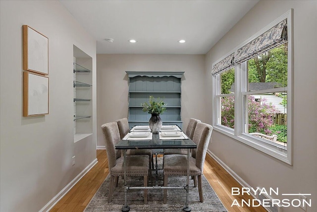 2120 Englewood Dr SE, East Grand Rapids, MI 49506 - dining space featuring baseboards, wood finished floors, and recessed lighting