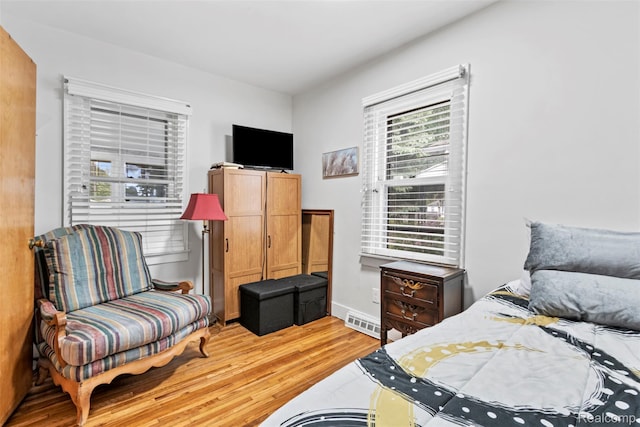 1141 E Madge Ave, Hazel Park, MI 48030 - bedroom with light wood-style flooring and baseboards