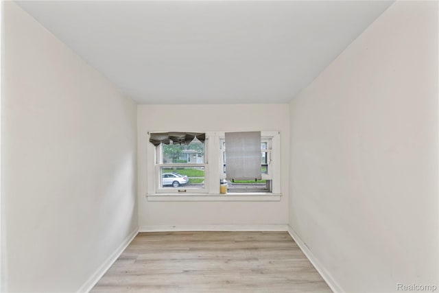 1141 E Madge Ave, Hazel Park, MI 48030 - spare room featuring light wood-style floors and baseboards