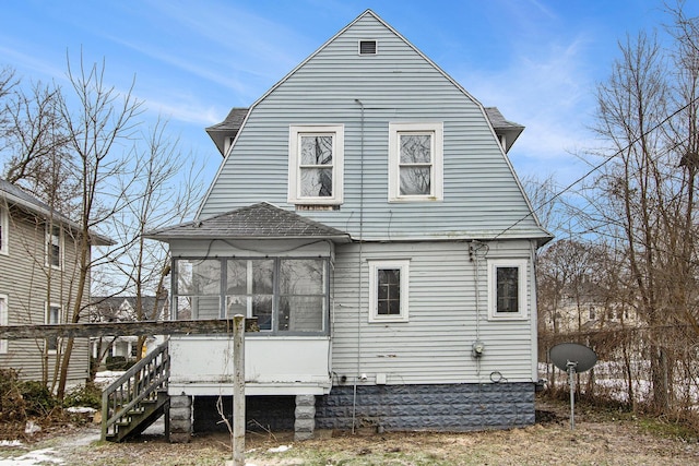 905 Lane Ave, Kalamazoo, MI 49001 - back of house with a sunroom, a deck, stairs, and a gambrel roof
