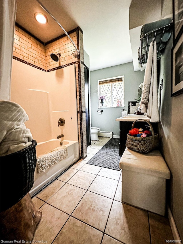 2109 S Lakeshore Rd, Harbor Beach, MI 48441 - bathroom featuring toilet, shower / washtub combination, vanity, tile patterned floors, and baseboards