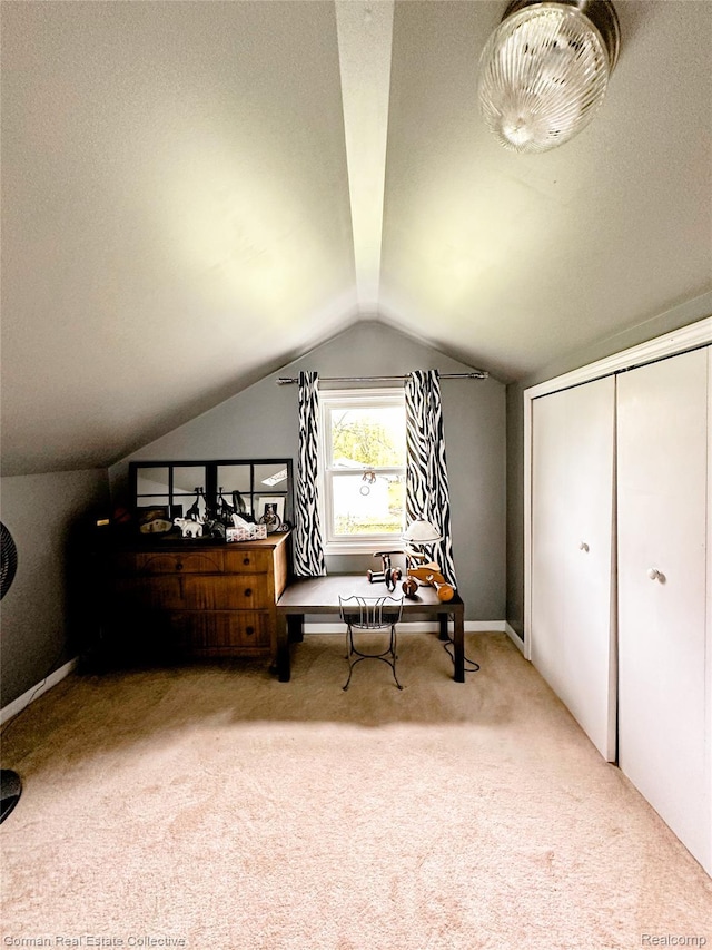 2109 S Lakeshore Rd, Harbor Beach, MI 48441 - living area with carpet floors and vaulted ceiling