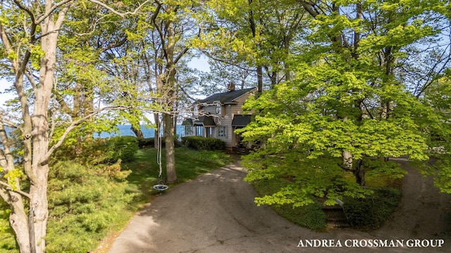 5011 Rosabelle Beach Ave, Holland, MI 49424 - view of front of home featuring a chimney