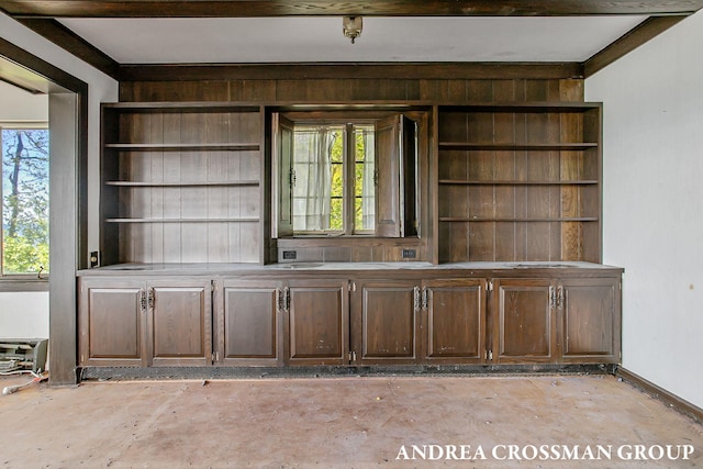 5011 Rosabelle Beach Ave, Holland, MI 49424 - unfurnished office with plenty of natural light, wooden walls, and baseboards