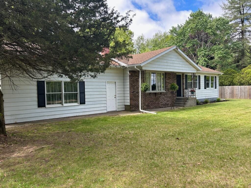 45523 Eleanor Dr, Decatur, MI 49045 - single story home with brick siding