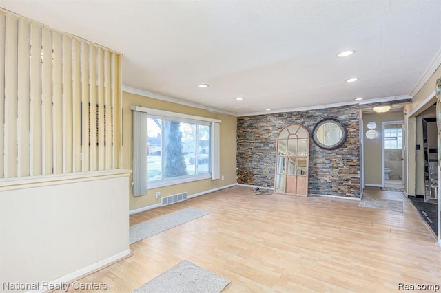 29249 Everett St, Southfield, MI 48076 - unfurnished living room featuring crown molding, plenty of natural light, wood finished floors, recessed lighting, and baseboards