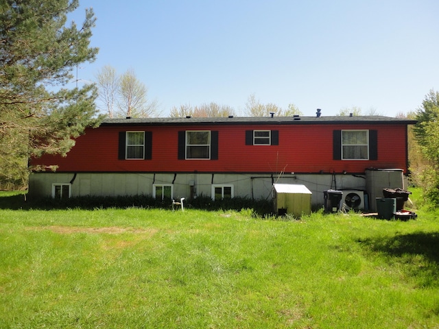 5925 113th Ave, Pullman, MI 49450 - rear view of house featuring washer / dryer and ac unit