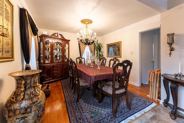 3300 Ellenboro Dr, Troy, MI 48083 - dining space featuring a chandelier and dark wood-style floors