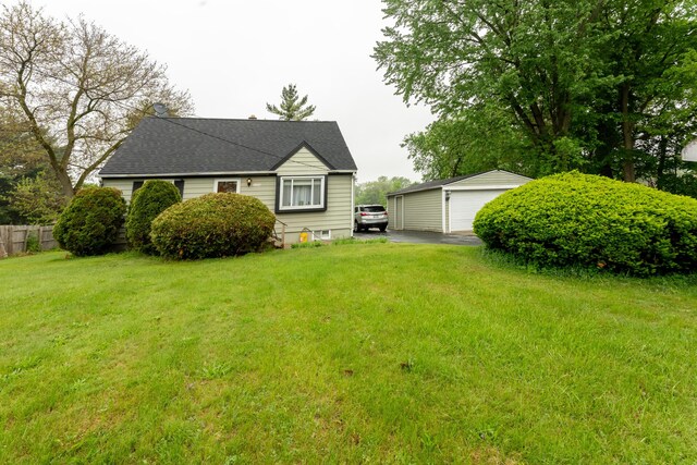 3300 Ellenboro Dr, Troy, MI 48083 - view of front of house featuring a garage, an outdoor structure, and roof with shingles