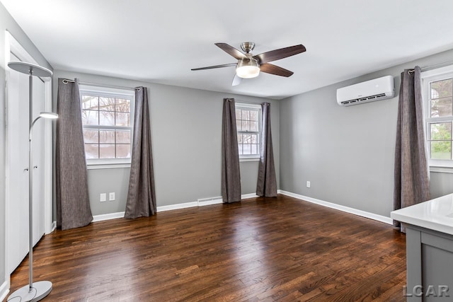 1706 Southgate Ct, Adrian, MI 49221 - unfurnished bedroom with an AC wall unit, wood finished floors, a ceiling fan, a baseboard heating unit, and baseboards