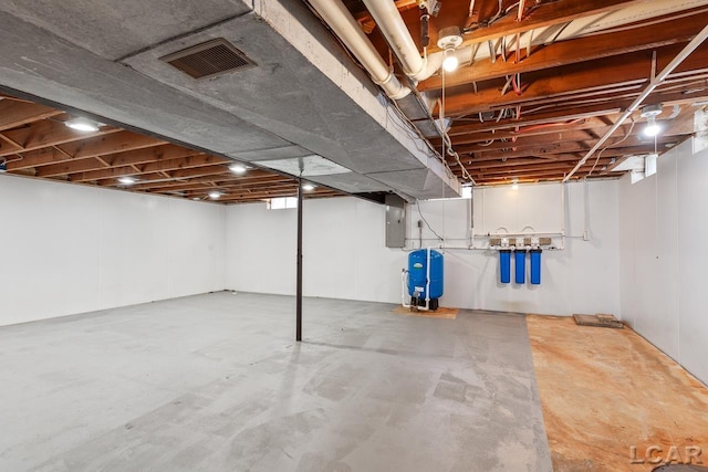 1706 Southgate Ct, Adrian, MI 49221 - below grade area featuring a water pressure tank and electric panel