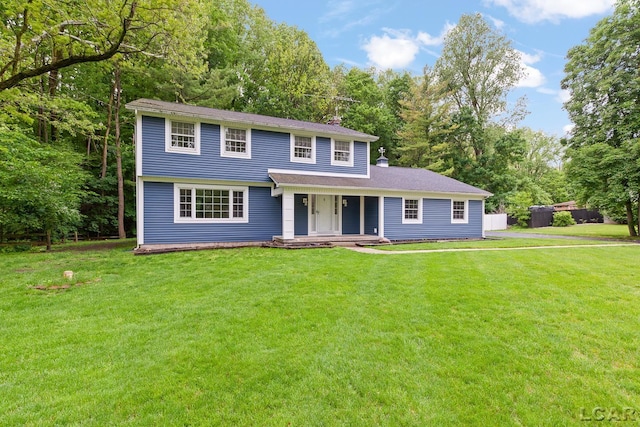 1706 Southgate Ct, Adrian, MI 49221 - view of front facade with covered porch and a front yard