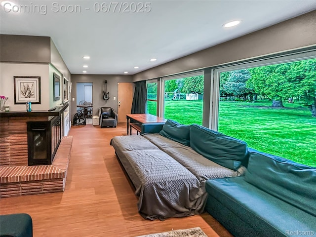 2211 N Sycamore Dr, Burton, MI 48509 - living area with light wood finished floors and recessed lighting