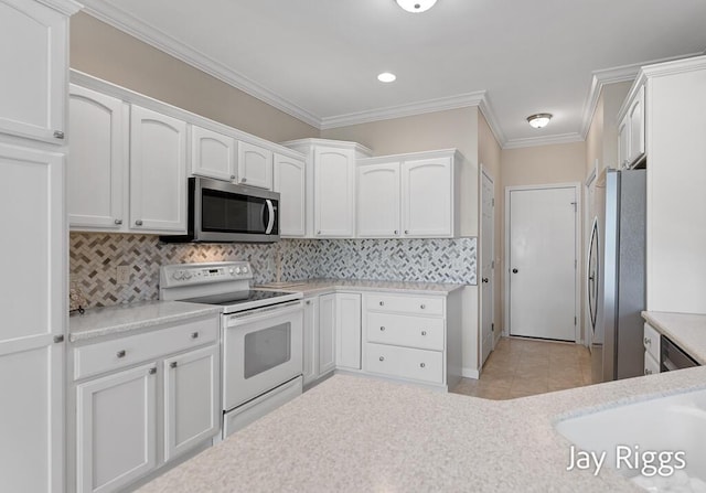 2632 E Turning Leaf Way Unit 111, Fruitport, MI 49415 - kitchen featuring stainless steel appliances, white cabinetry, light tile patterned floors, tasteful backsplash, and crown molding
