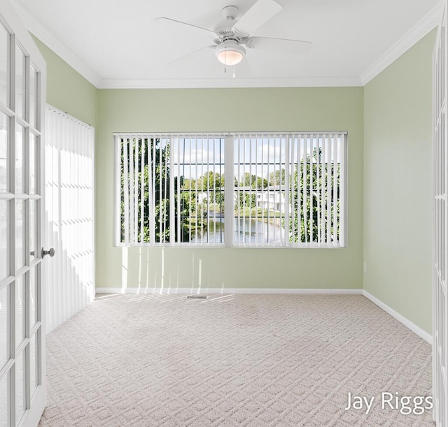 2632 E Turning Leaf Way Unit 111, Fruitport, MI 49415 - carpeted empty room featuring a ceiling fan, ornamental molding, and baseboards