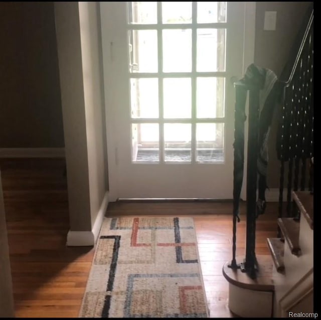 8312 E Outer Dr, Detroit, MI 48213 - doorway with wood finished floors and baseboards