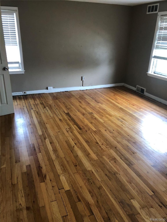 8312 E Outer Dr, Detroit, MI 48213 - unfurnished room with wood-type flooring and baseboards