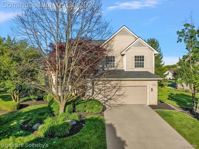 31190 Kingsley Ct, Novi, MI 48377 - traditional-style house with concrete driveway, an attached garage, and a front yard