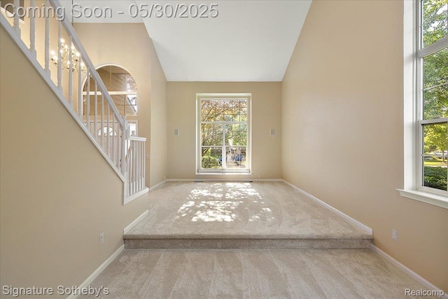 31190 Kingsley Ct, Novi, MI 48377 - entryway featuring stairs, carpet floors, and vaulted ceiling