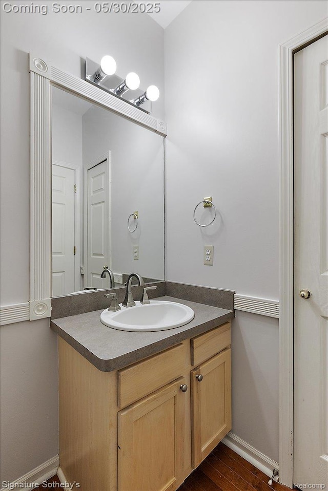31190 Kingsley Ct, Novi, MI 48377 - bathroom featuring vanity and wood finished floors