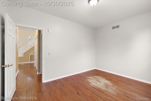 31190 Kingsley Ct, Novi, MI 48377 - spare room with hardwood / wood-style flooring and baseboards