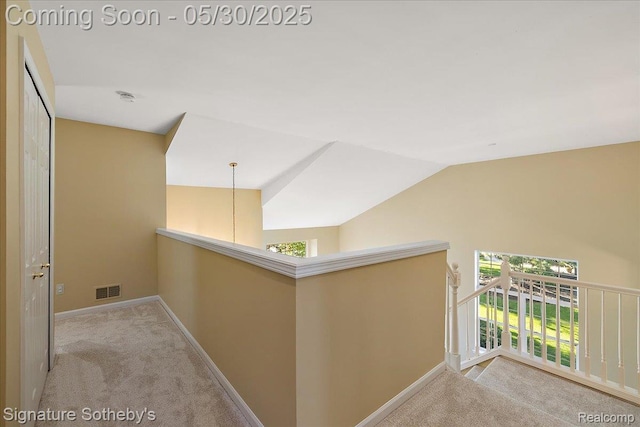 31190 Kingsley Ct, Novi, MI 48377 - corridor featuring carpet floors, an upstairs landing, and vaulted ceiling