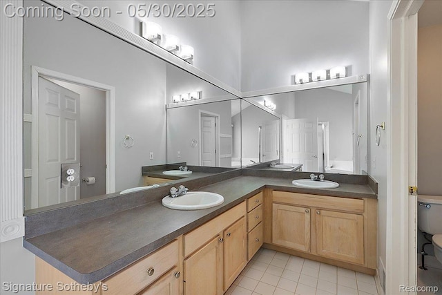 31190 Kingsley Ct, Novi, MI 48377 - bathroom featuring double vanity and tile patterned flooring