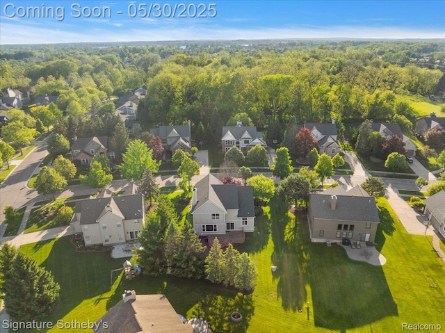 31190 Kingsley Ct, Novi, MI 48377 - aerial view of residential area with a heavily wooded area