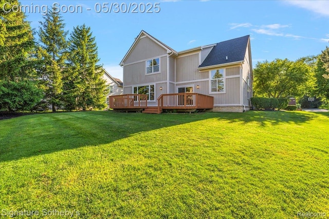 31190 Kingsley Ct, Novi, MI 48377 - rear view of property featuring a lawn and a deck